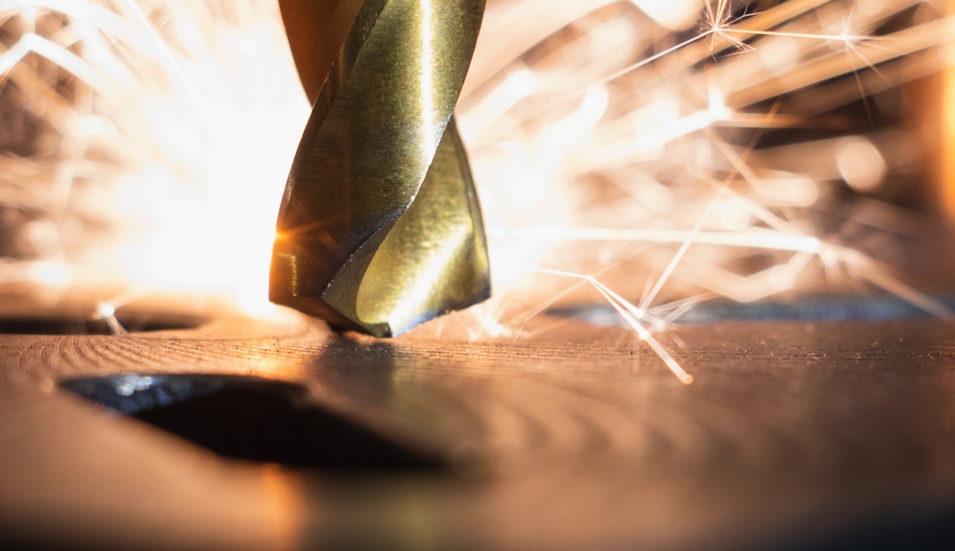 Golden drill bit with metal sparks-1