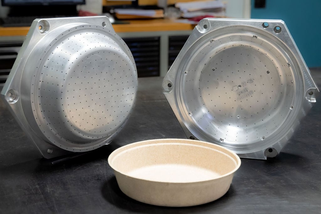 Fiber molded thermoforming tool in the shape of a bowl