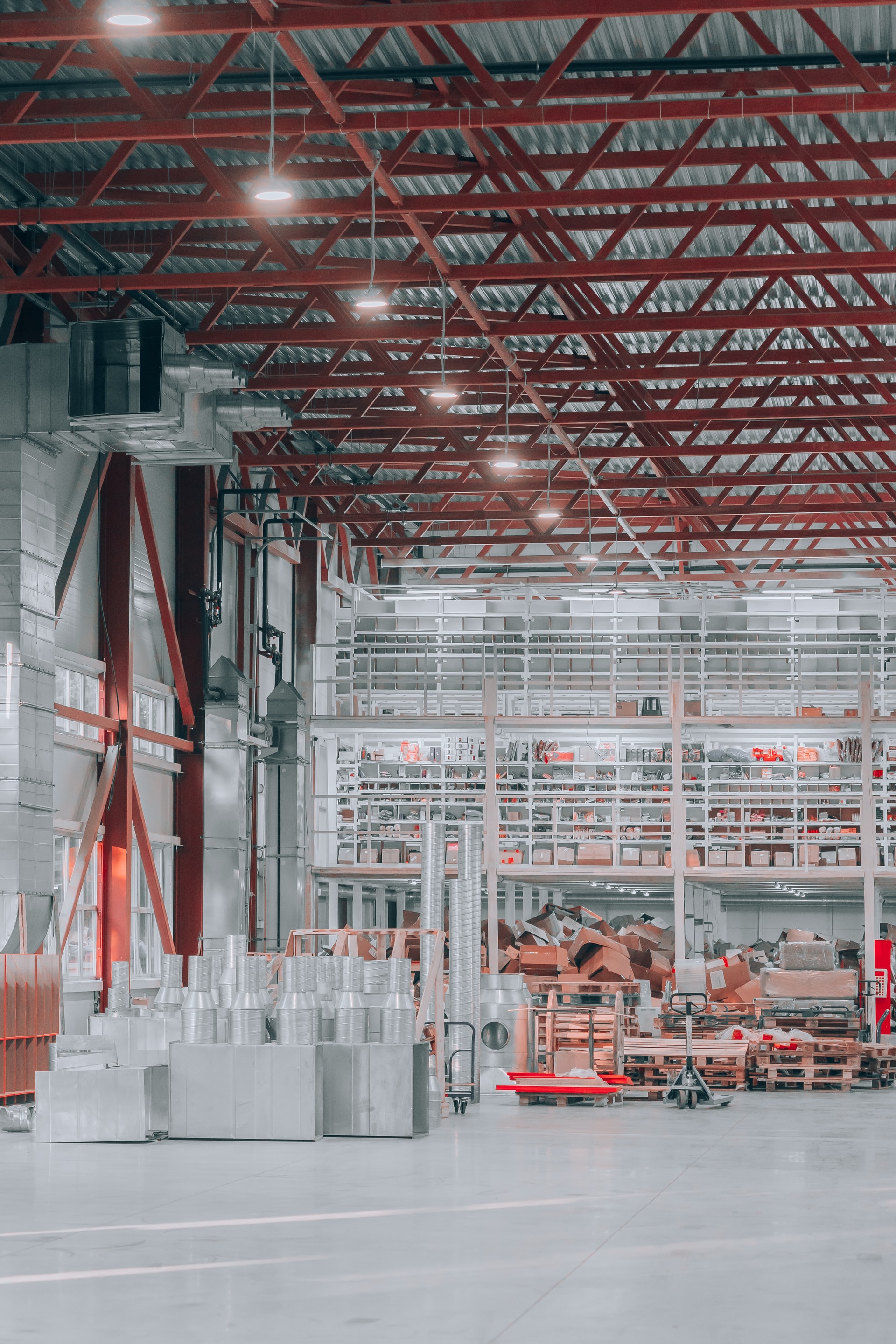 Manufacturing warehouse with red iron beams