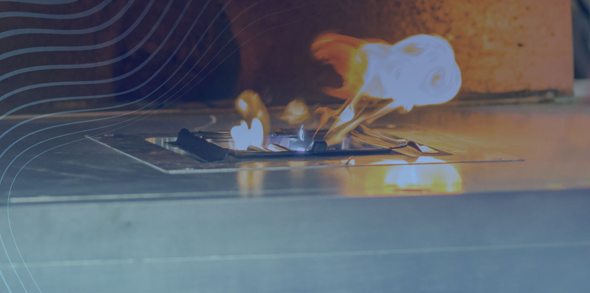 Close up of metal being thermo treated with fire