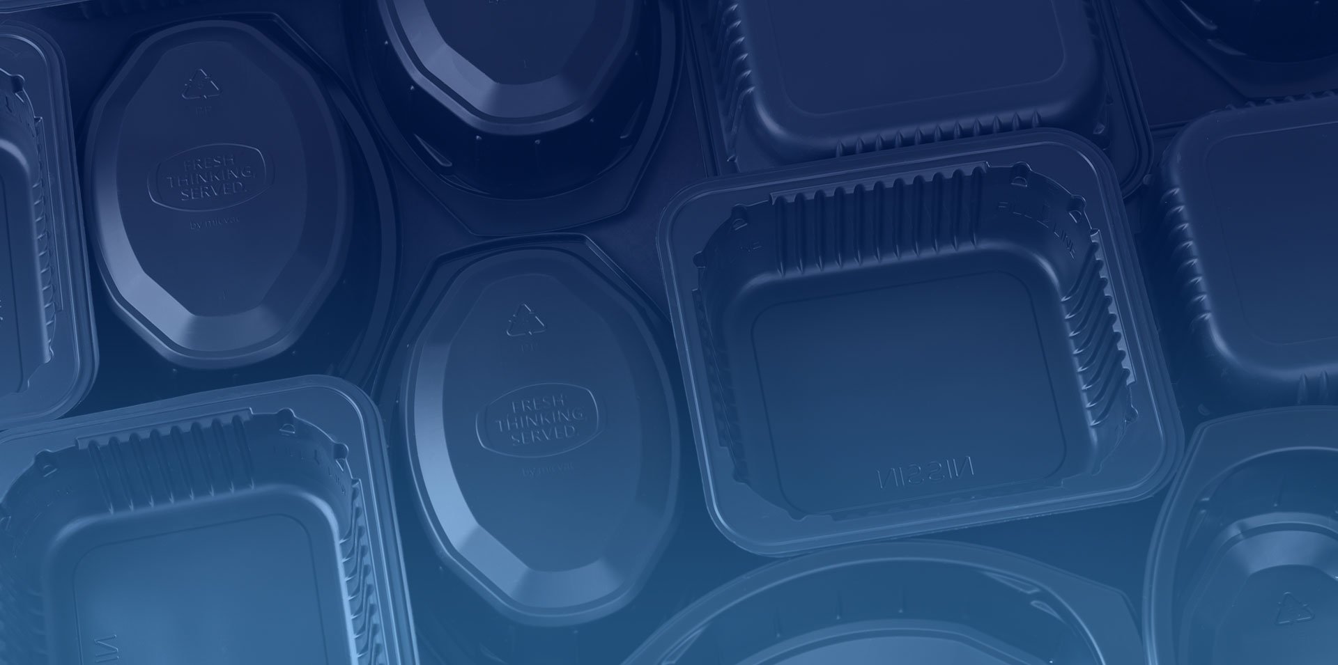 Close up of plastic food molds that have been thermoformed