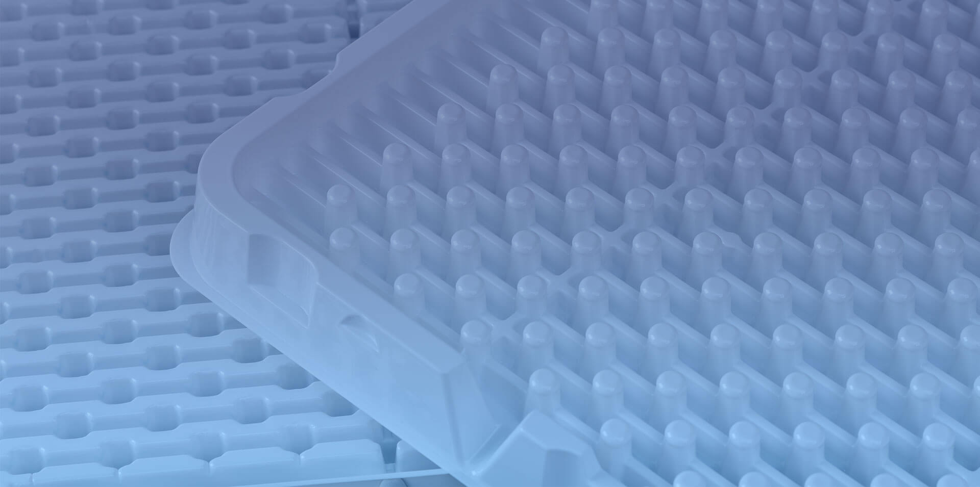 Close up of white thermoformed industrial plastics