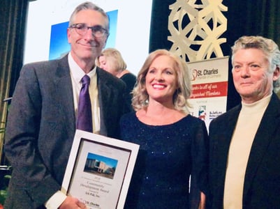 Tony beyer and scott carter accept 2018 community development award