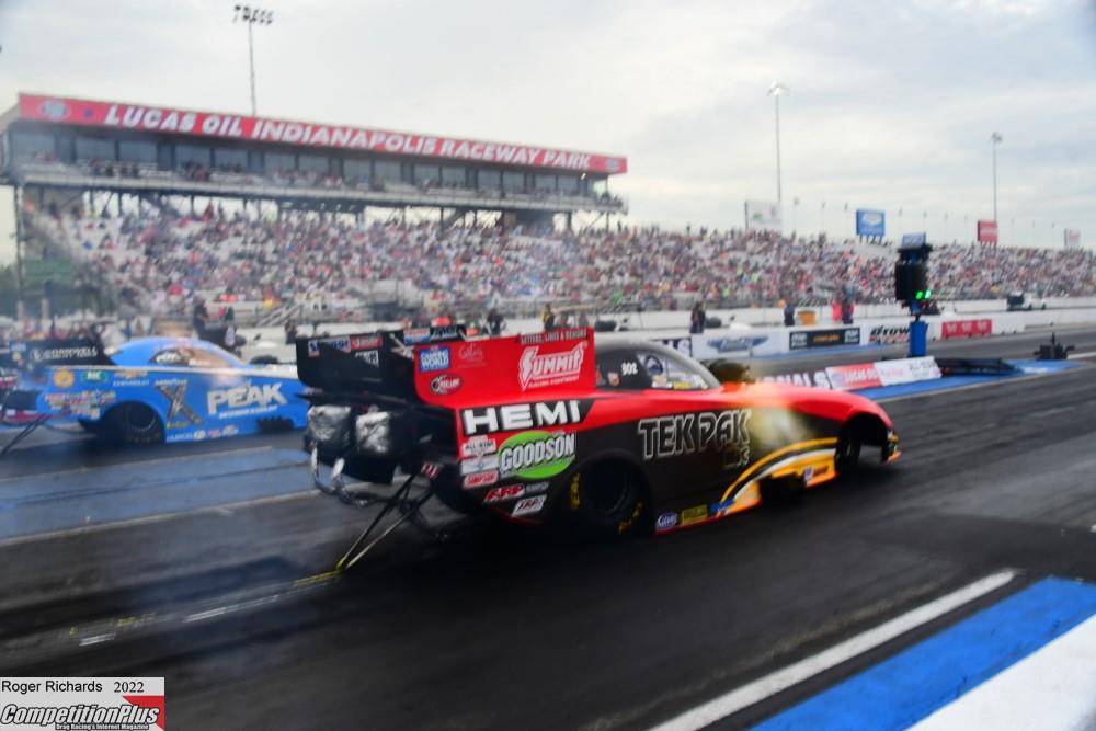 Close up of the Tek Pak nitro car drag racing being driven by Dale Creasy Jr.